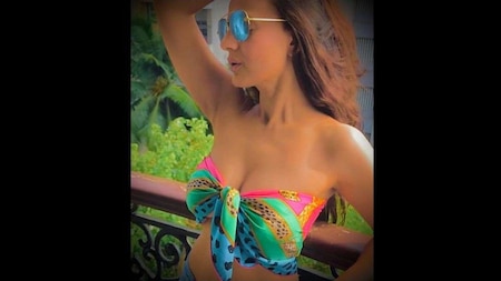 Ameesha Patel looks stunning in multicoloured bikini