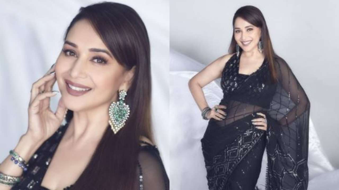 Madhuri Dixit is the epitome of grace in a semi-sheer black saree designed  by Manish Malhotra - see pics
