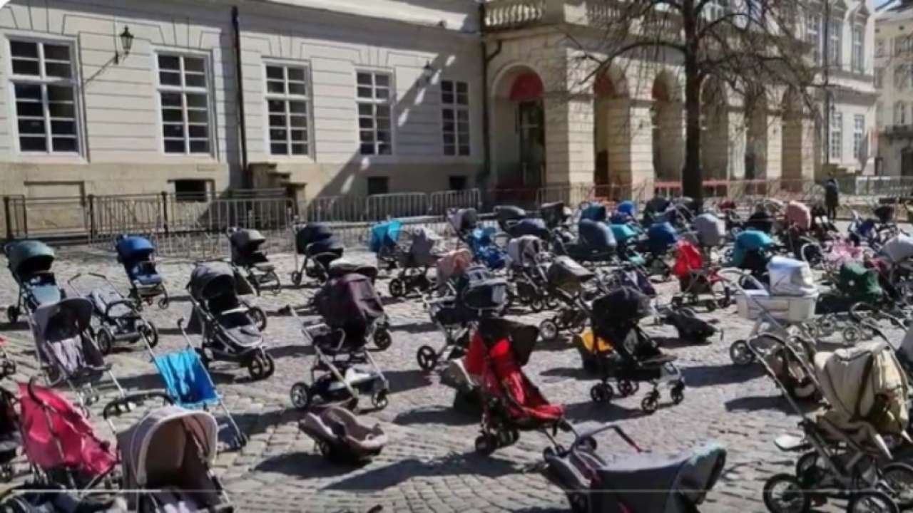 Empty strollers in Lviv's central square a symbol of children killed in Russia-Ukraine war