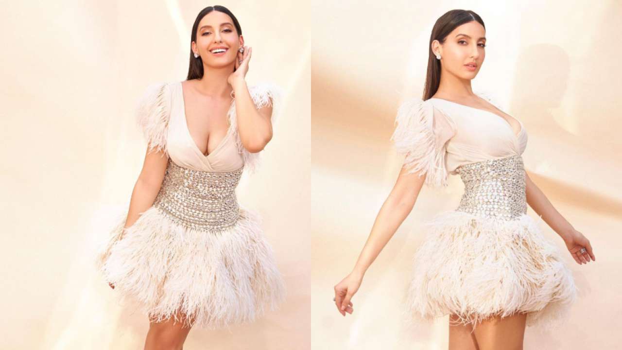 Nora Fatehi sets internet on fire in white feather dress featuring plunging  neckline