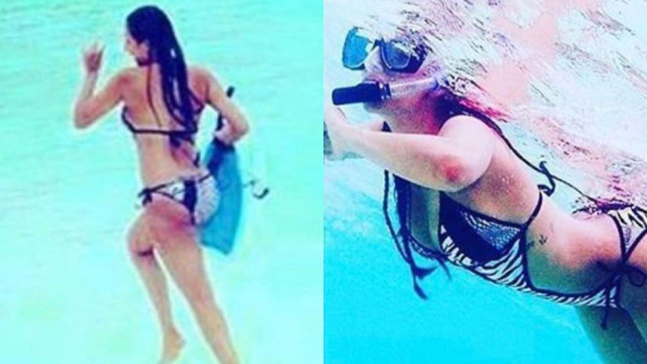 Malaika Arora turns beach baby, flaunts her sexy curves in printed bikini