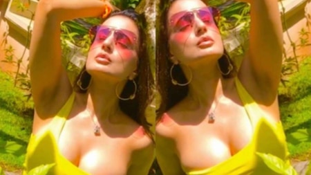 Ameesha Patel in yellow bikini