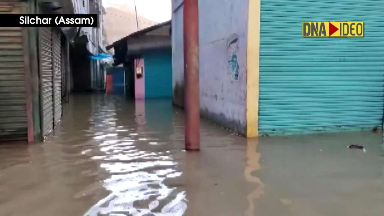 Assam flood situation worsens: Silchar gets submerged in water, people commute on boats