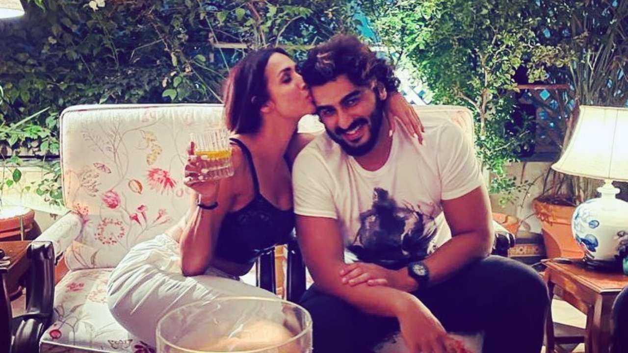 Malaika Arora kisses beau Arjun Kapoor