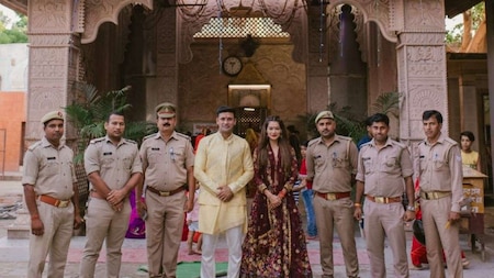 Payal Rohatgi and  Sangram Singh posing with cops