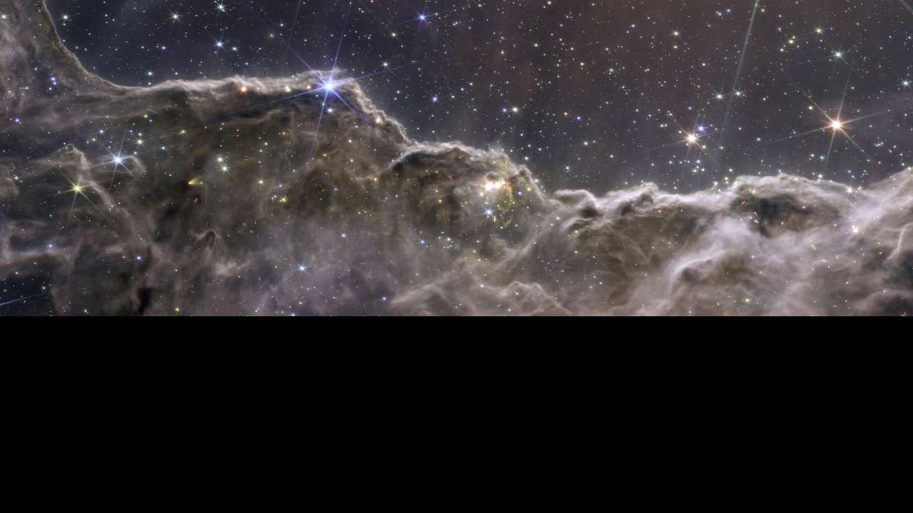 Does anybody see a humanoid head figure in this image from James Webb  Telescope the Cosmic Cliffs  9GAG