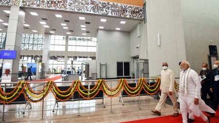 PM Modi inspects the Deoghar Airport with Jharkhand Governor Ramesh Bais