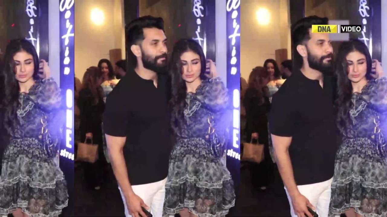 Newlyweds Mouni Roy and Suraj Nambiar pose for paparazzi in Mumbai