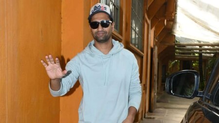 Vicky Kaushal waves at paps