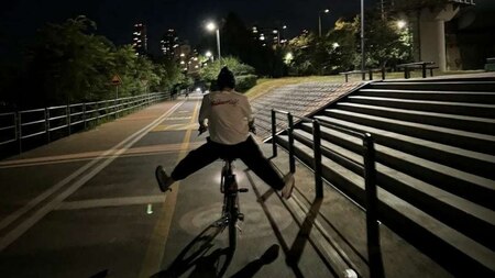 J-Hope posing on cycle