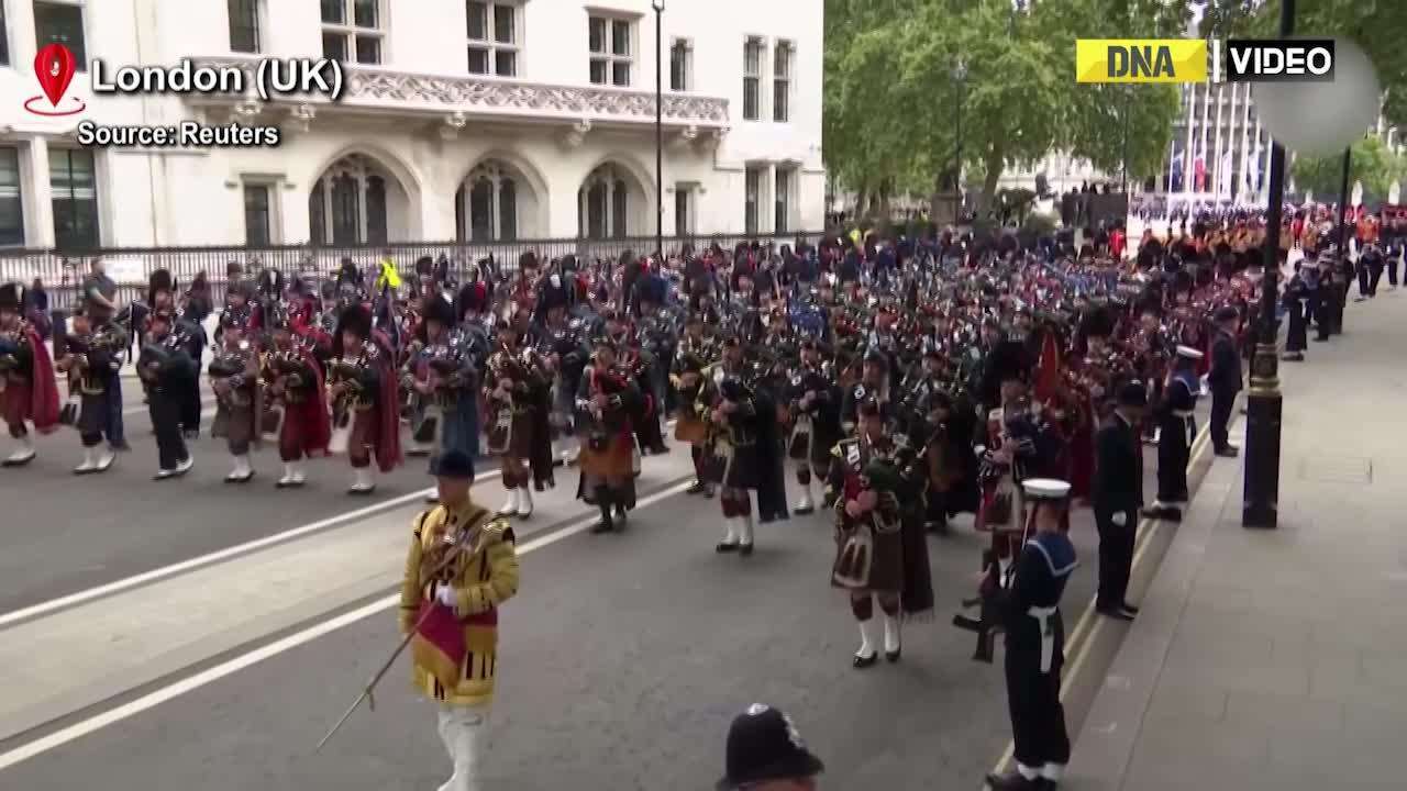 Queen Elizabeth II’s coffin carried to Westminster Abbey for her state funeral 