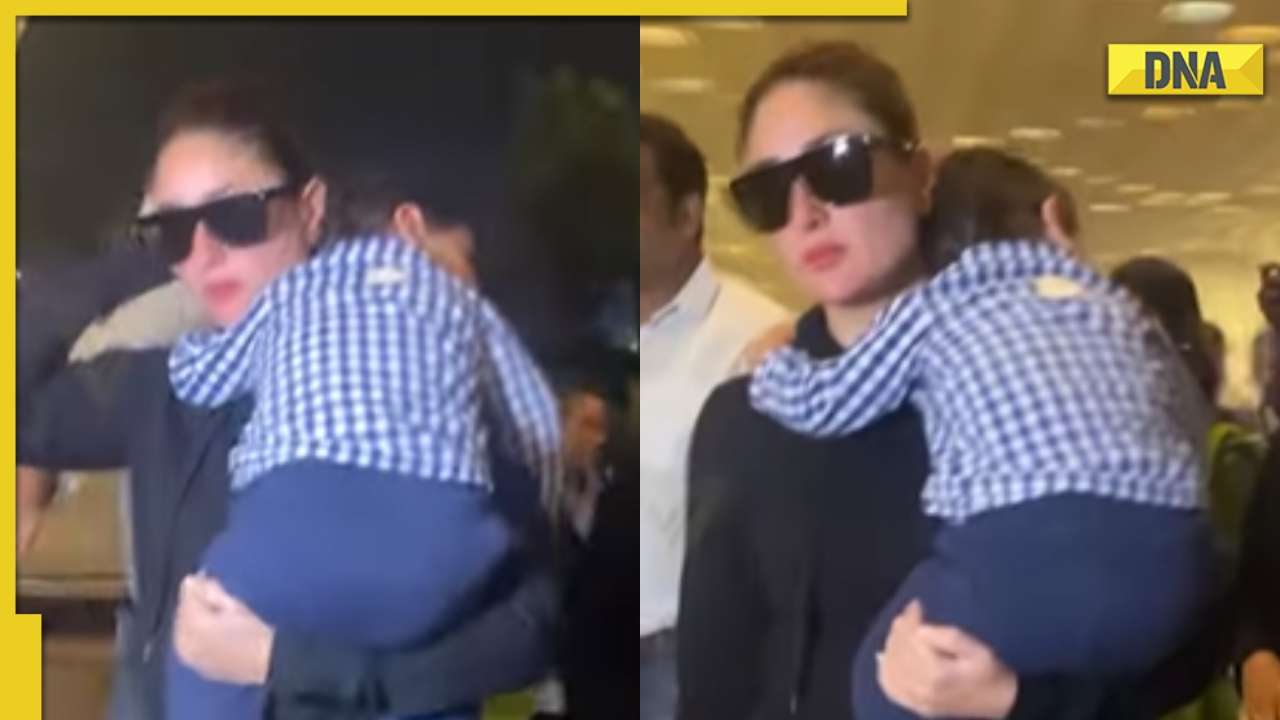 Kareena Kapoor carries son Jeh Ali Khan in her arms as they arrive at Mumbai airport