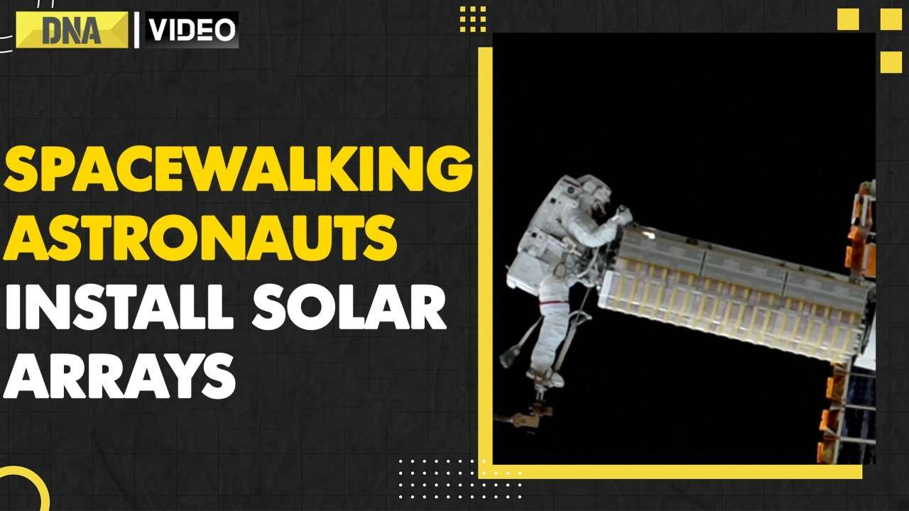 NASA astronauts take spacewalk to install solar array onto ISS