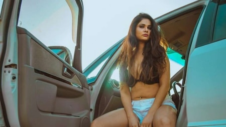 Aabha Paul in blue shorts and bra