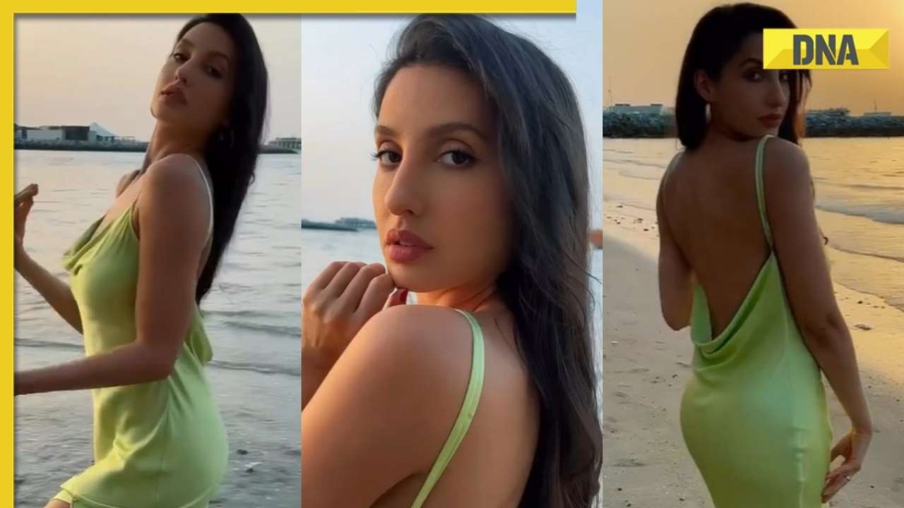 1280px x 720px - Watch: Old video of Nora Fatehi walking on the beach in backless,  thigh-high slit dress