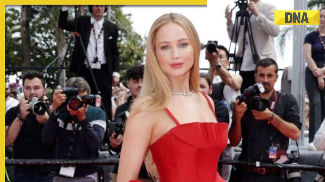 Jennifer Lawrence defies unofficial dress code as she dons flip flops on Cannes red carpet