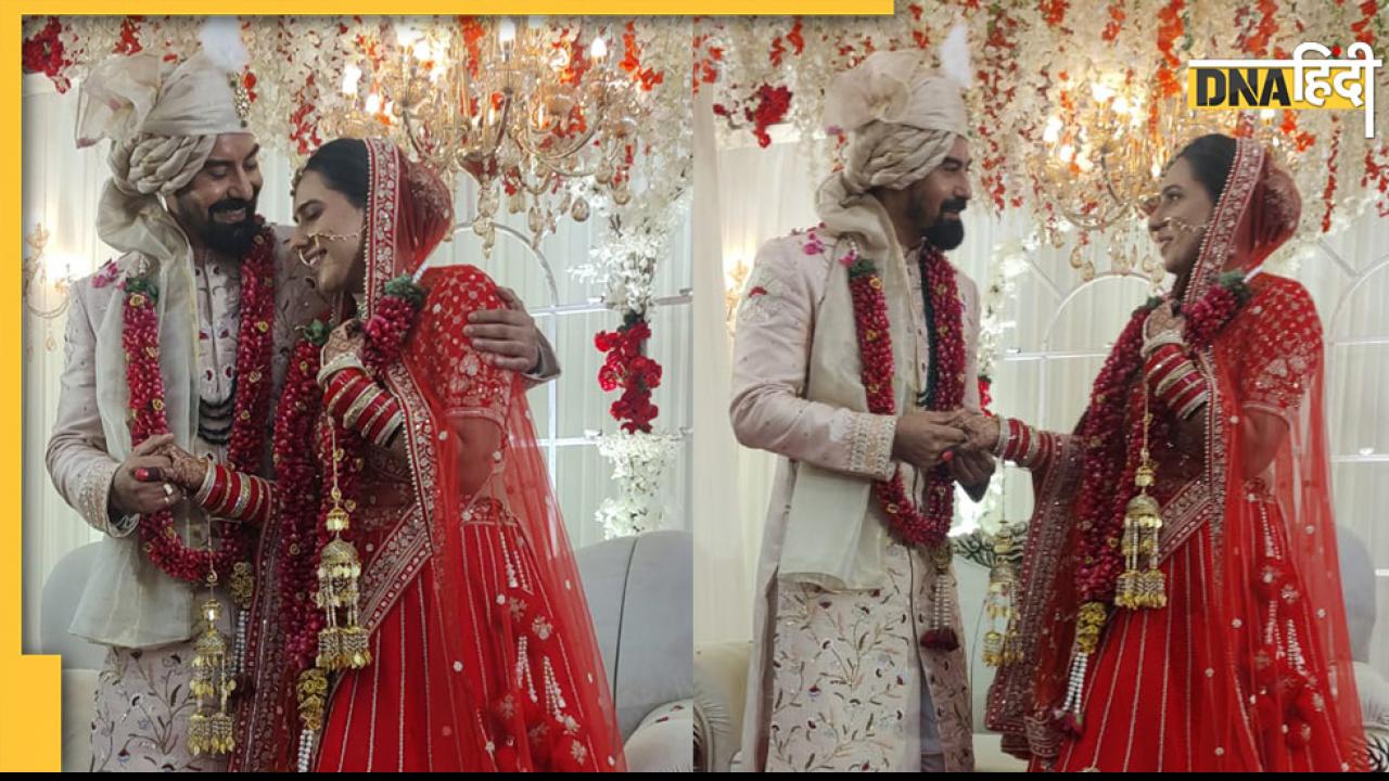 Kabir Duhan Singh hugs his wife at wedding