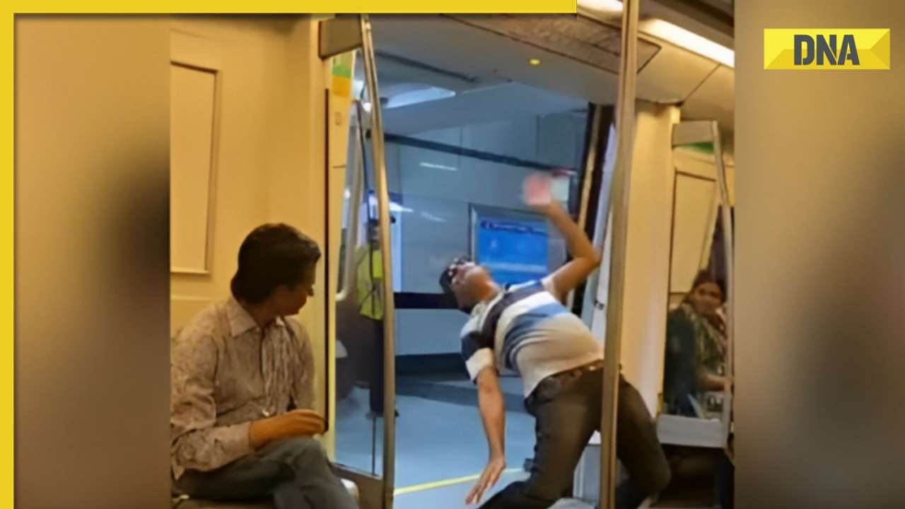 Viral video of man's peculiar stunts in delhi metro baffles onlookers, internet reacts