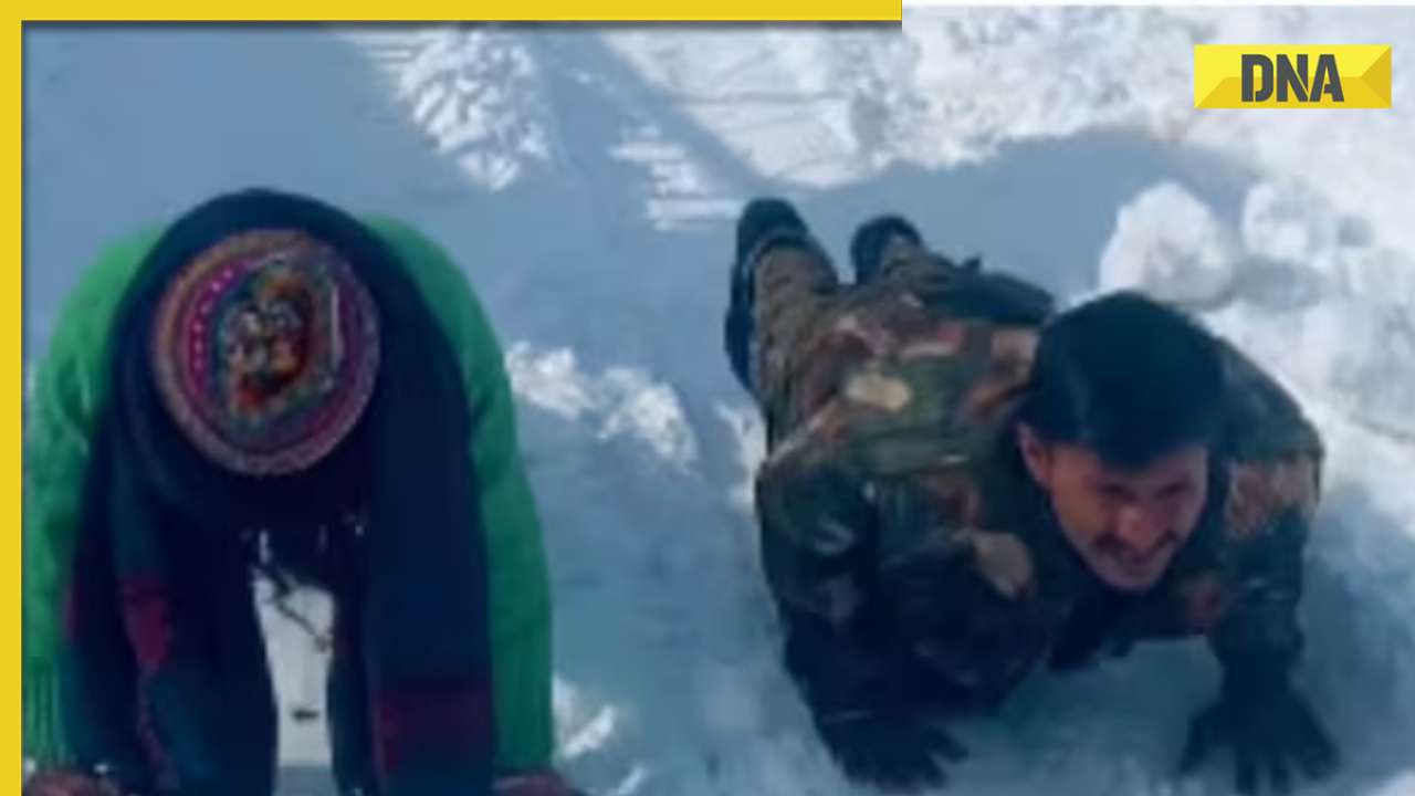 Woman's inspiring push-up challenge with soldier in snowy terrain goes viral, watch
