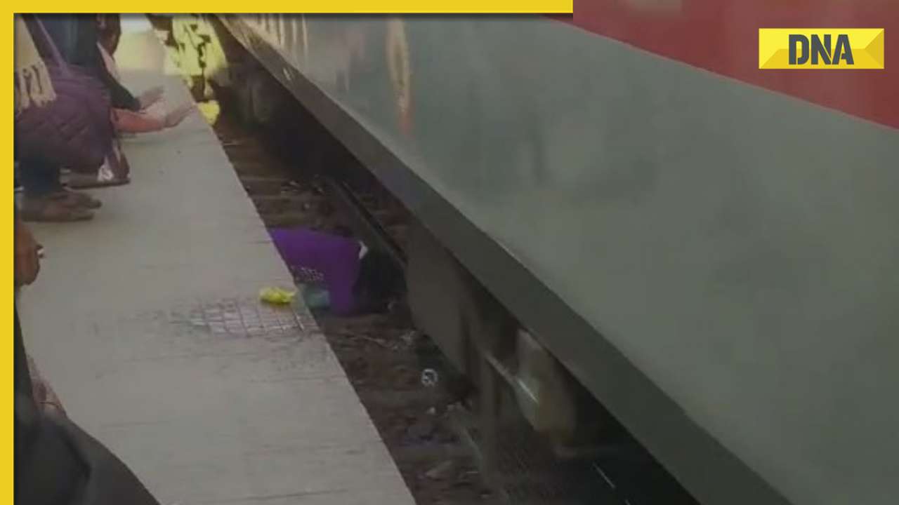 Miraculous survival: Mother and children escape unharmed after train passes over them, watch