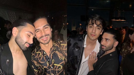 Orry making his signature pose with Dino Morea and Ahaan Panday