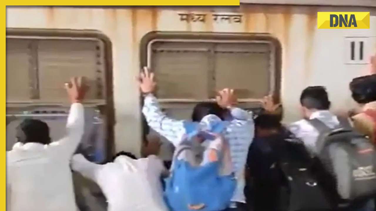 Viral video: Passengers push Mumbai local train coach to save man trapped under it, watch