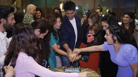 Pashminna cast and crew cut the customised cake