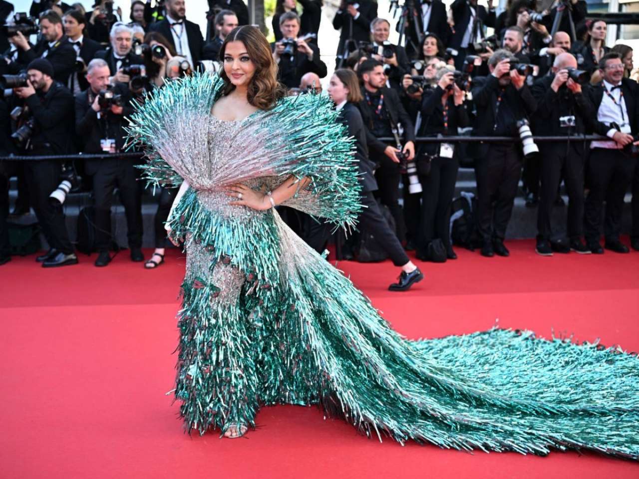 Aishwarya Rai walks Cannes red carpet in bizarre gown made of confetti ...