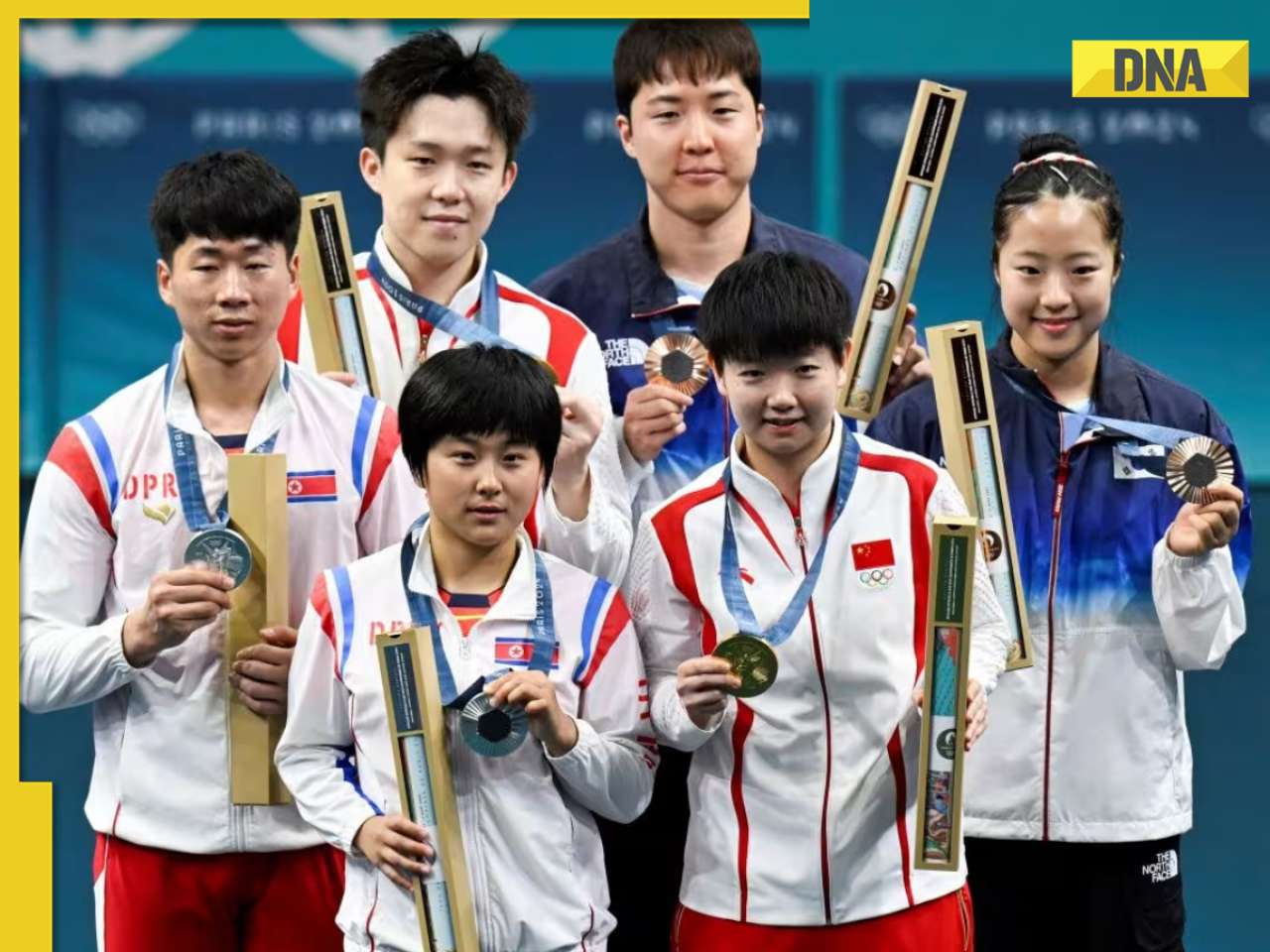 North Korean table tennis pair may face punishment for 'smiling' with rivals on Olympic podium