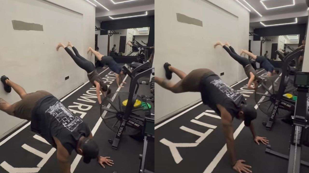 Feet-elevated plank shoulder taps