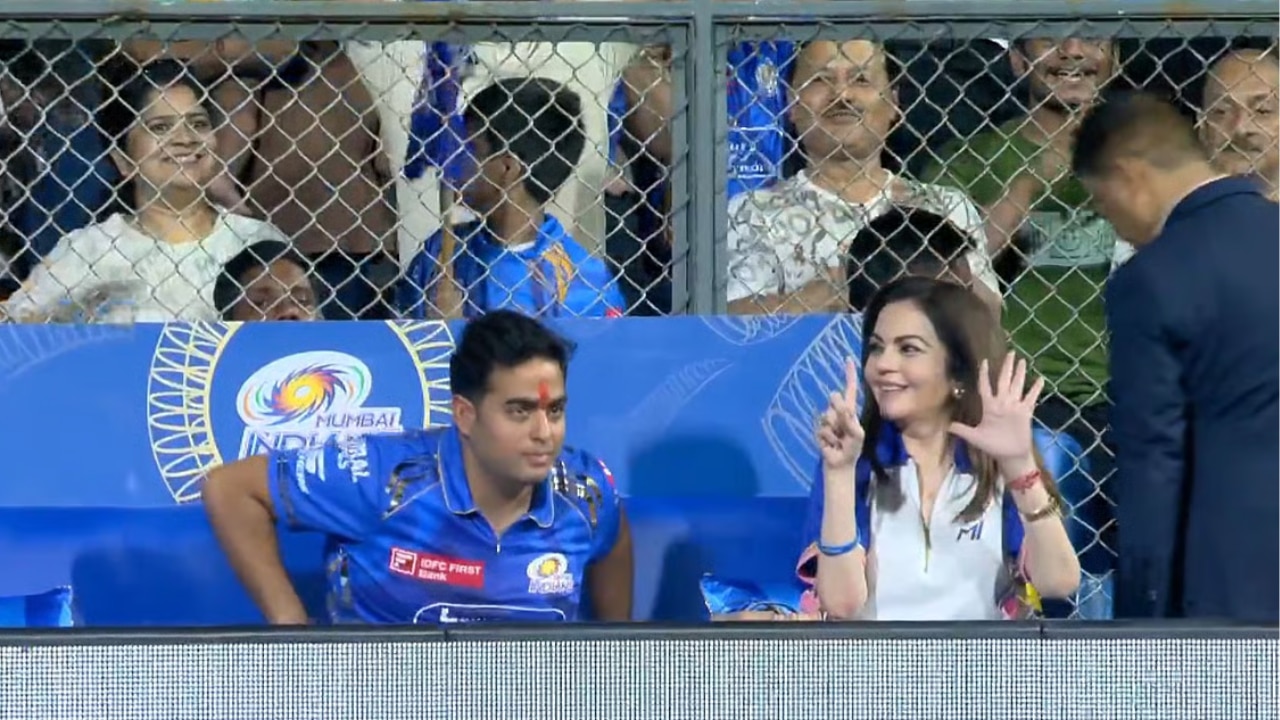 Akash Ambani and Nita Ambani look