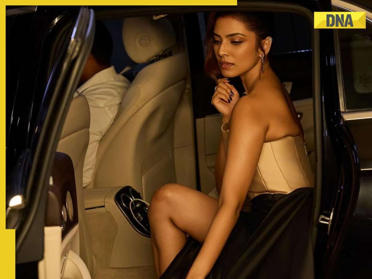 Malavika Mohanan serves glamour in gold corset top paired with black slit skirt; SEE PICS