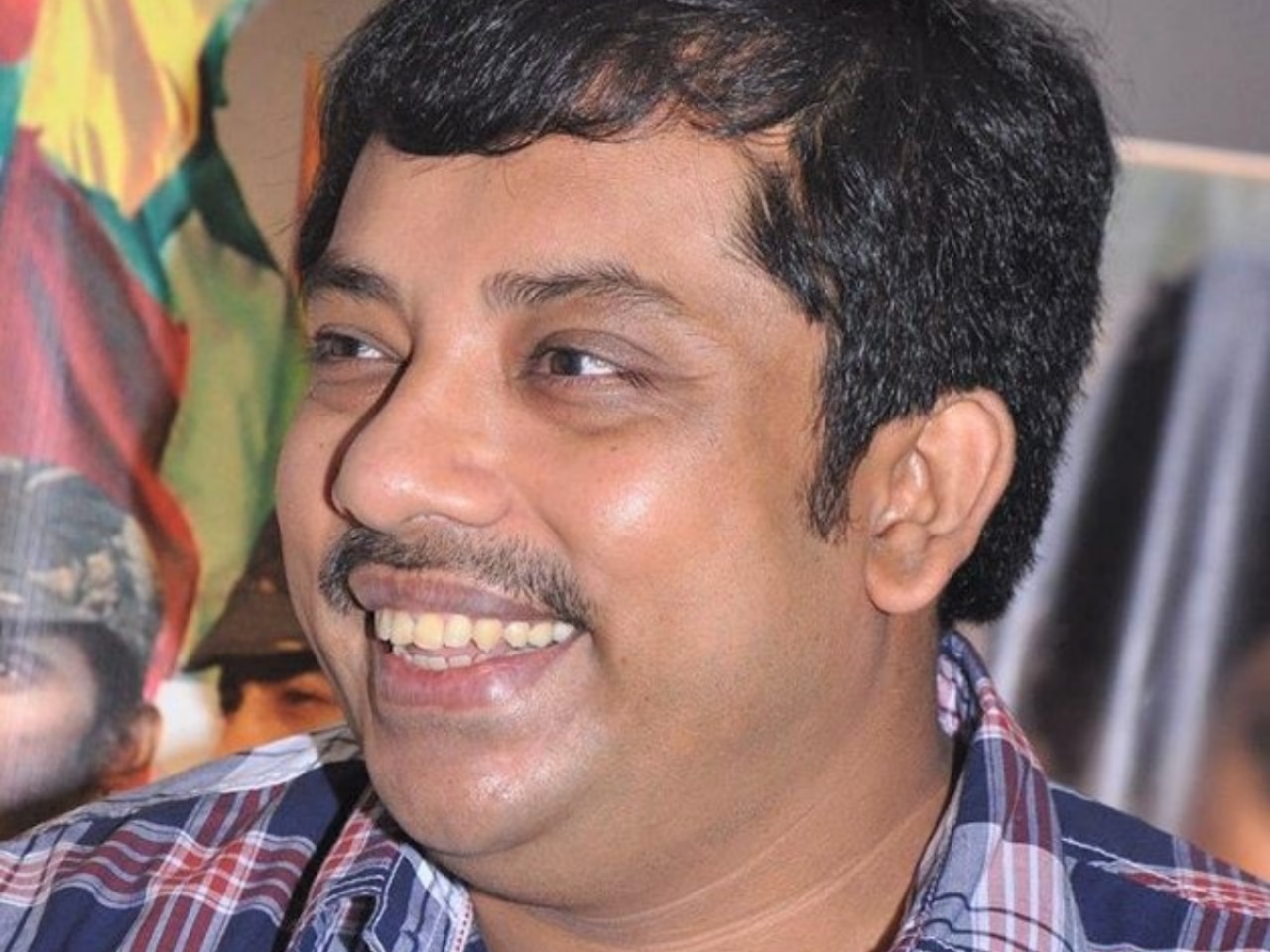 Where is Sathyan living now?