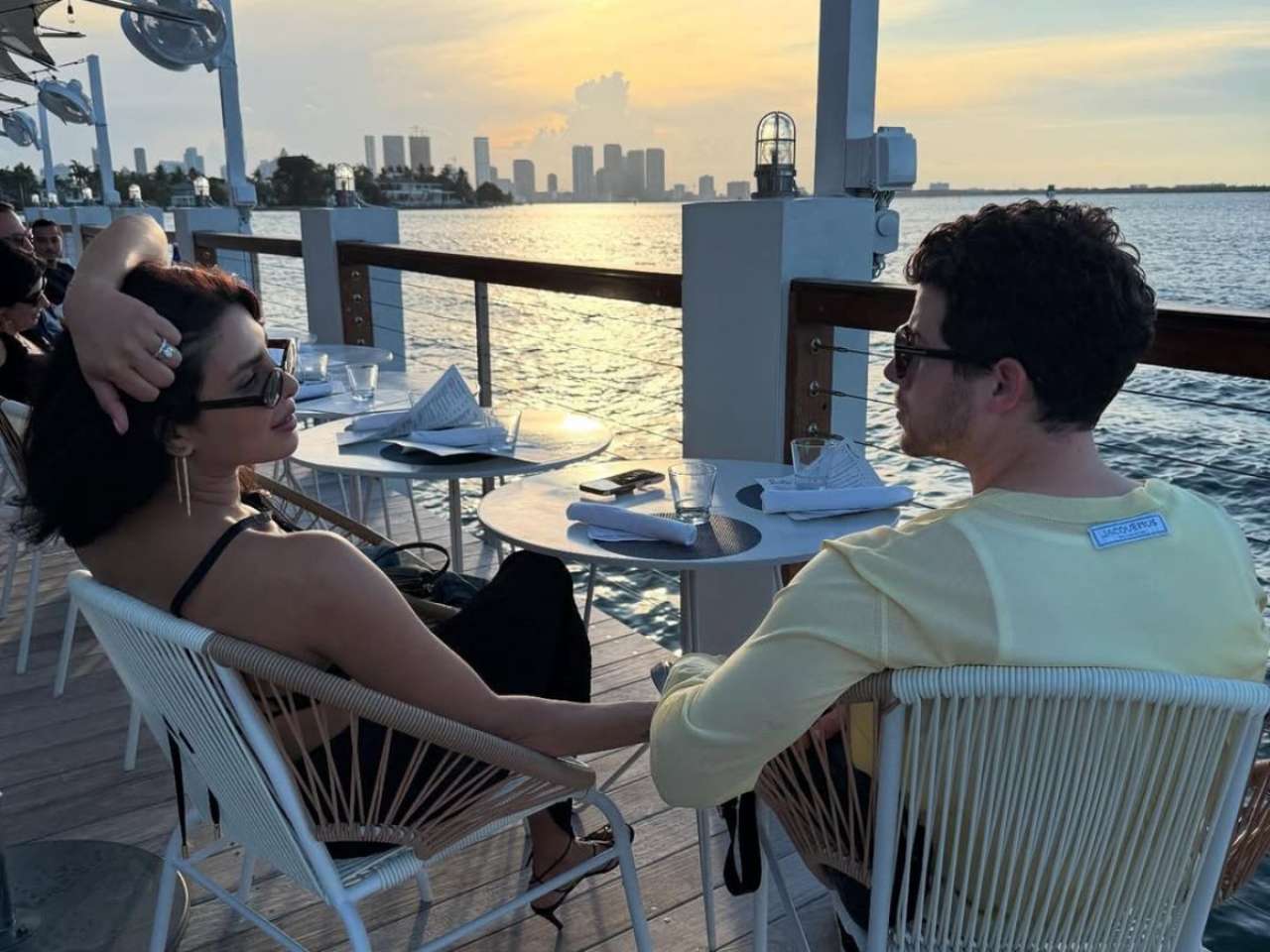 Romantic photo with Nick Jonas by the Miami waterfront