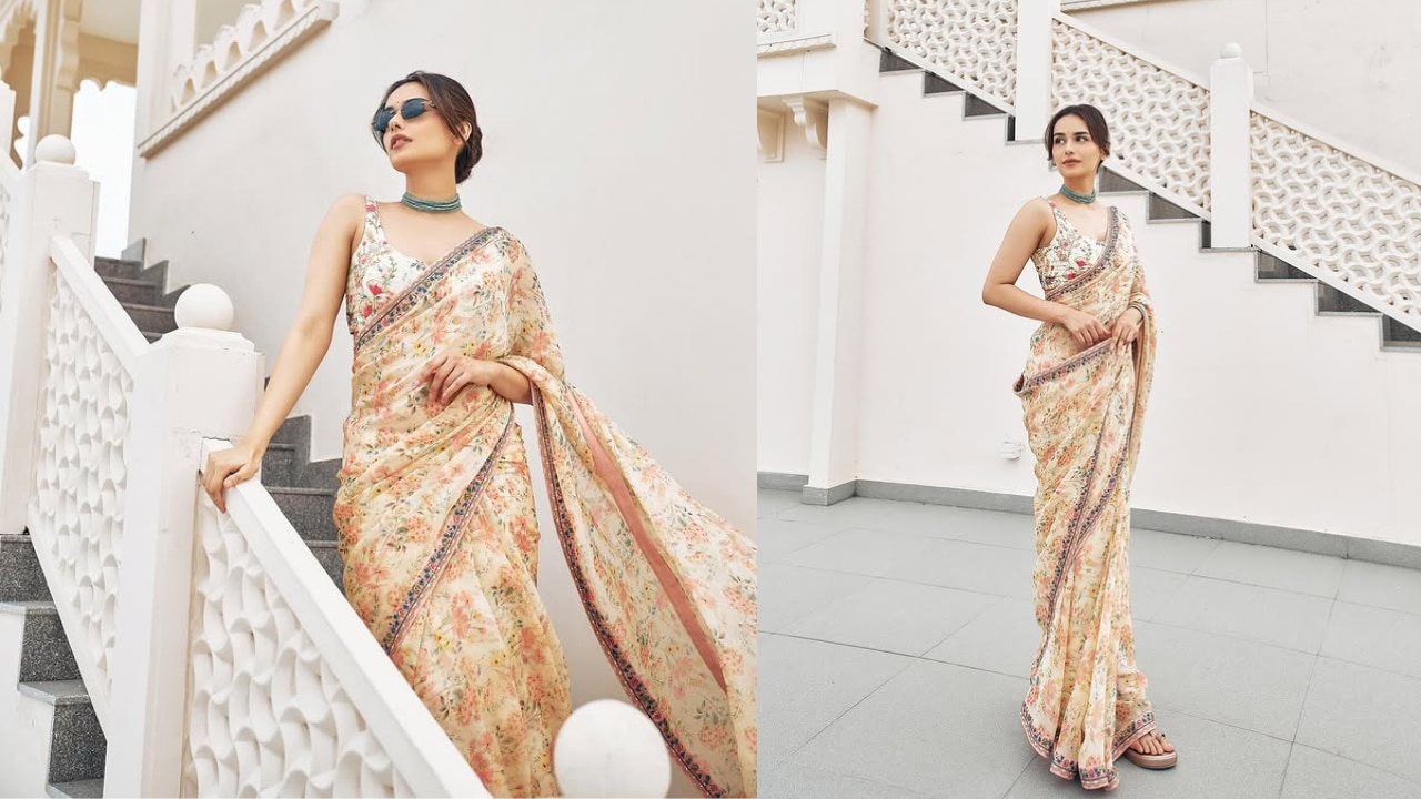 Manushi's blouse design completes the look