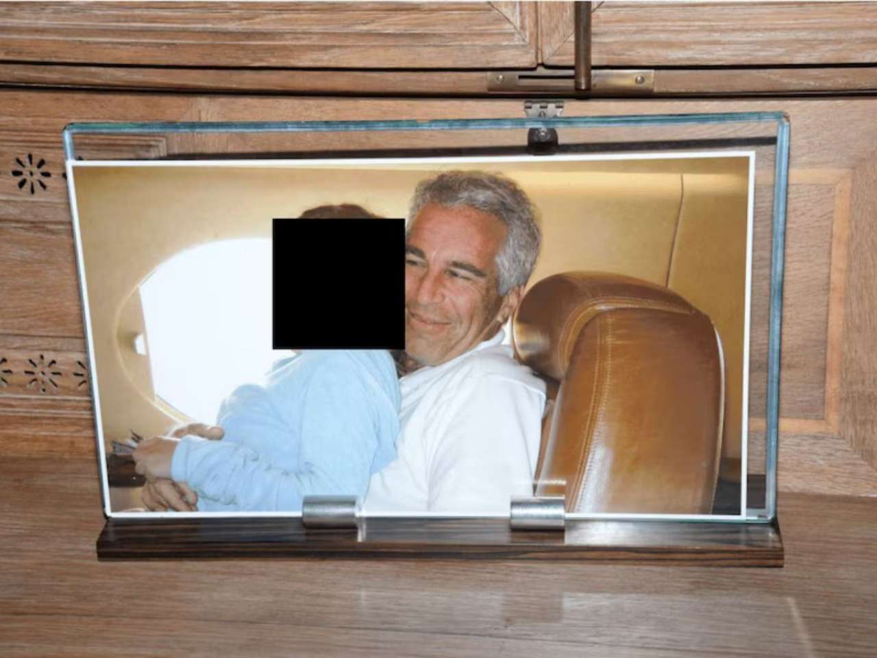 Jeffrey Epstein with minor girl in his Lolita Express