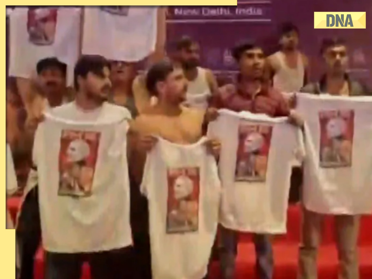 Watch Video: After robodog row, shirtless men at AI Impact Summit 2026, Youth Congress members protest outside venue