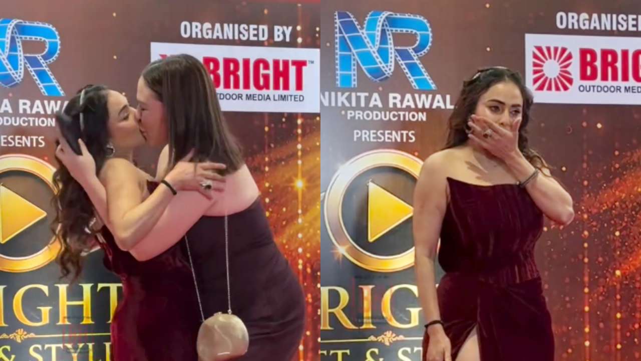 Female fan forcefully kisses Nikita Rawal on lips at red carpet, video goes viral - Watch