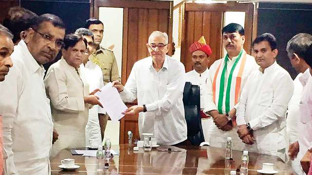 Ahmed Patel shifts focus to Gujarat issues, meets Governor OP Kohli to ...