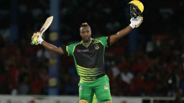 Andre Russell celebrates his century on Saturday