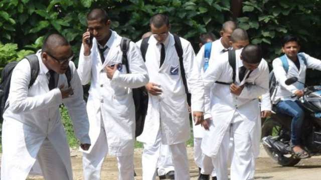 Students with tonsured head