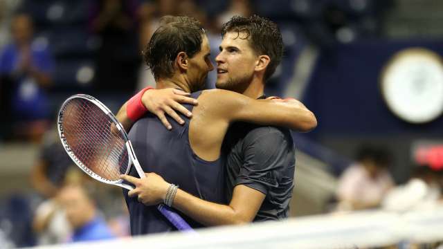 Rafael Nadal embraces Dominic Thiem after their match on Wednesday
