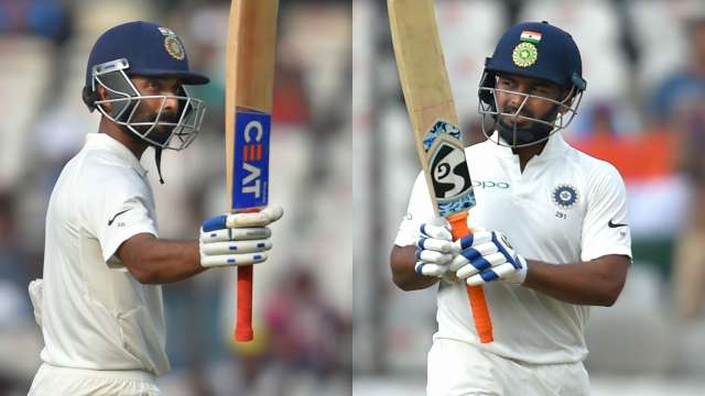 Ajinkya Rahane (L) and Rishabh Pant celebrate their half-centuries on Saturday