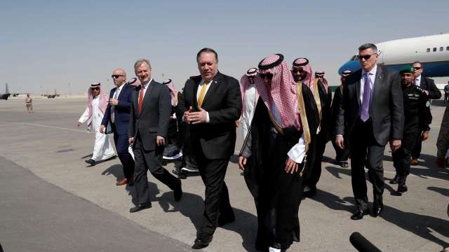 U.S. Secretary of State Mike Pompeo walks with Saudi Foreign Minister Adel al-Jubei
