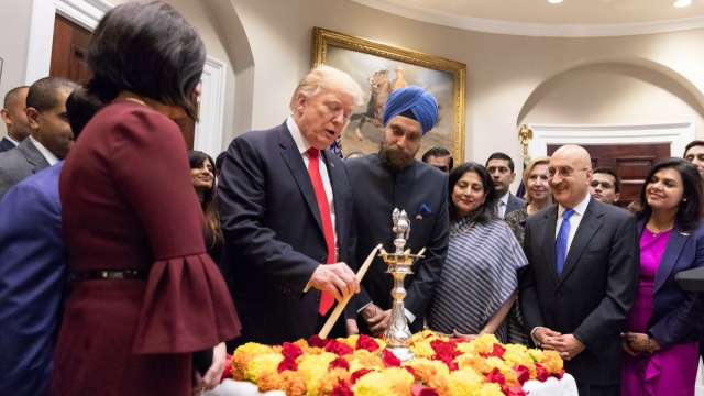 Donald Trump lighting the ceremonial diya