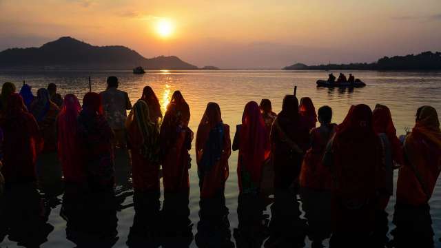 (Devotees offer prayers on Chhath Puja)