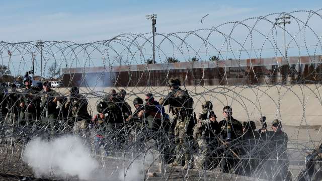 US soldiers fire tear gas 