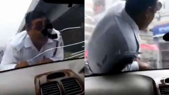 Viral Video Man Drags Traffic Cop On Cars Bonnet To Escape Paper Check 9824