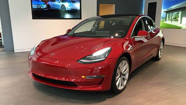 wait-is-over-indian-official-takes-test-ride-in-tesla-model-3-in-delhi