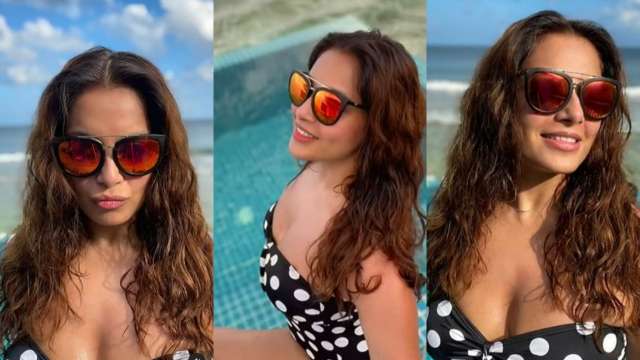 Bipasha Basu sets hearts racing in sexy black bikini as she holidays with  husband Karan Singh Grover in Maldives